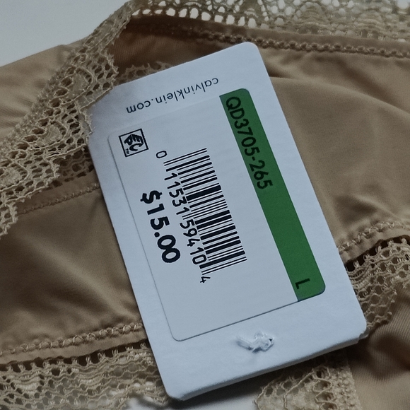 NWT CALVIN KLEIN FLIRTY MICRO THONG PANTY IN DESERT SIZE LARGE - Picture 4 of 5